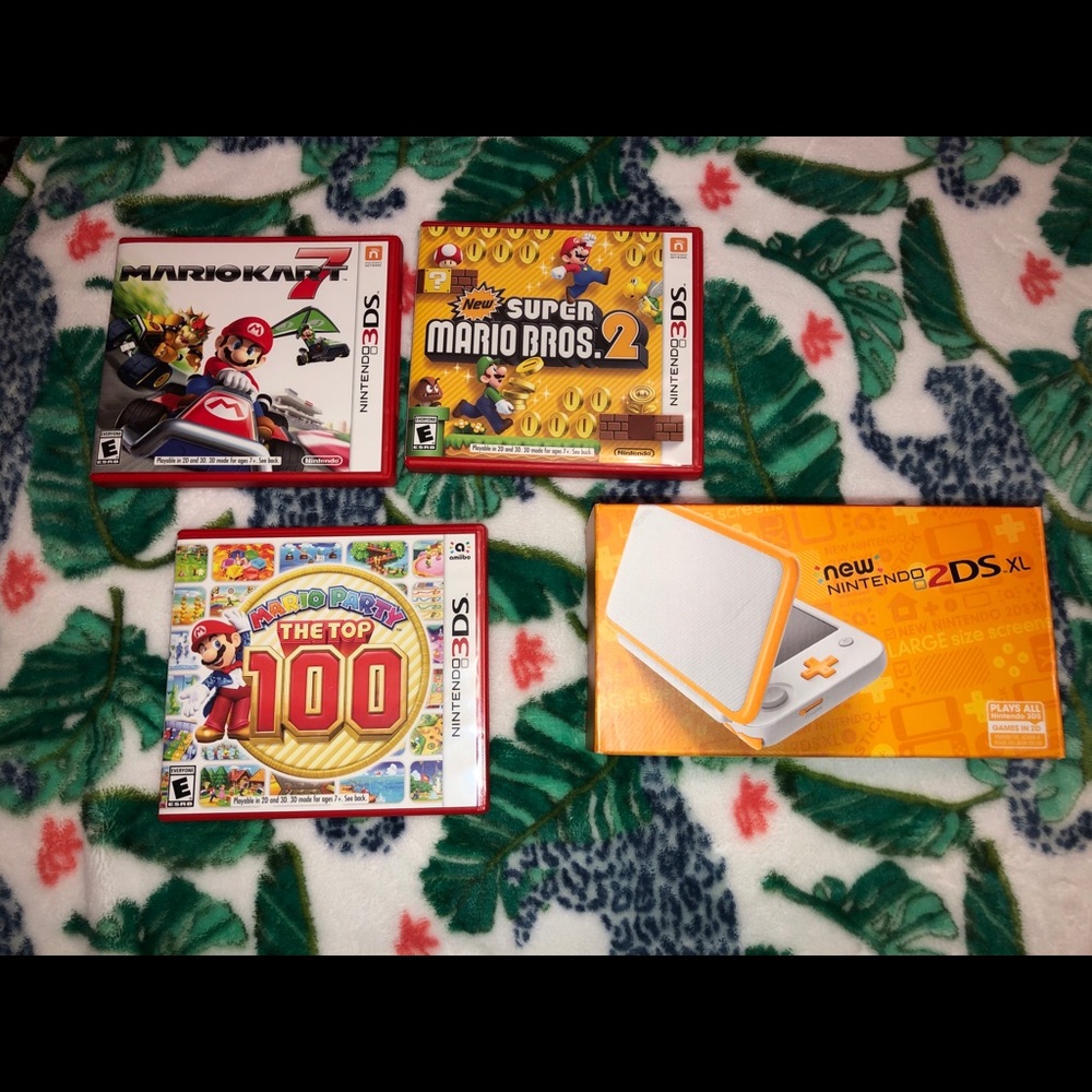 Orange and White Nintendo 2DS XL With Accessories